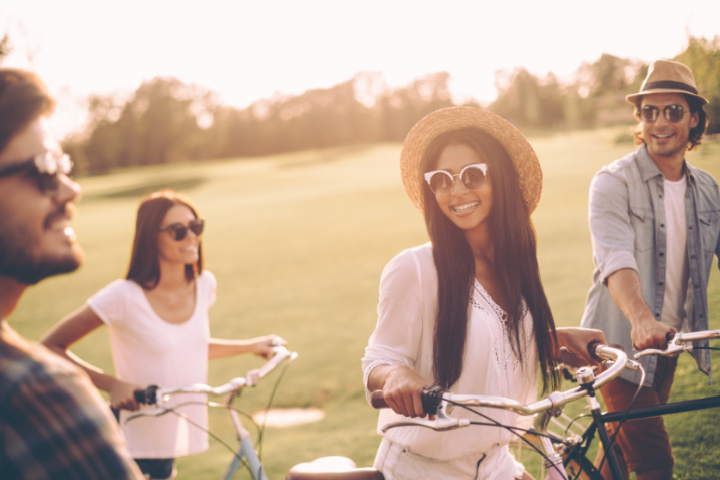 young people riding bikes