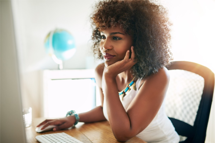 female business owner at laptop