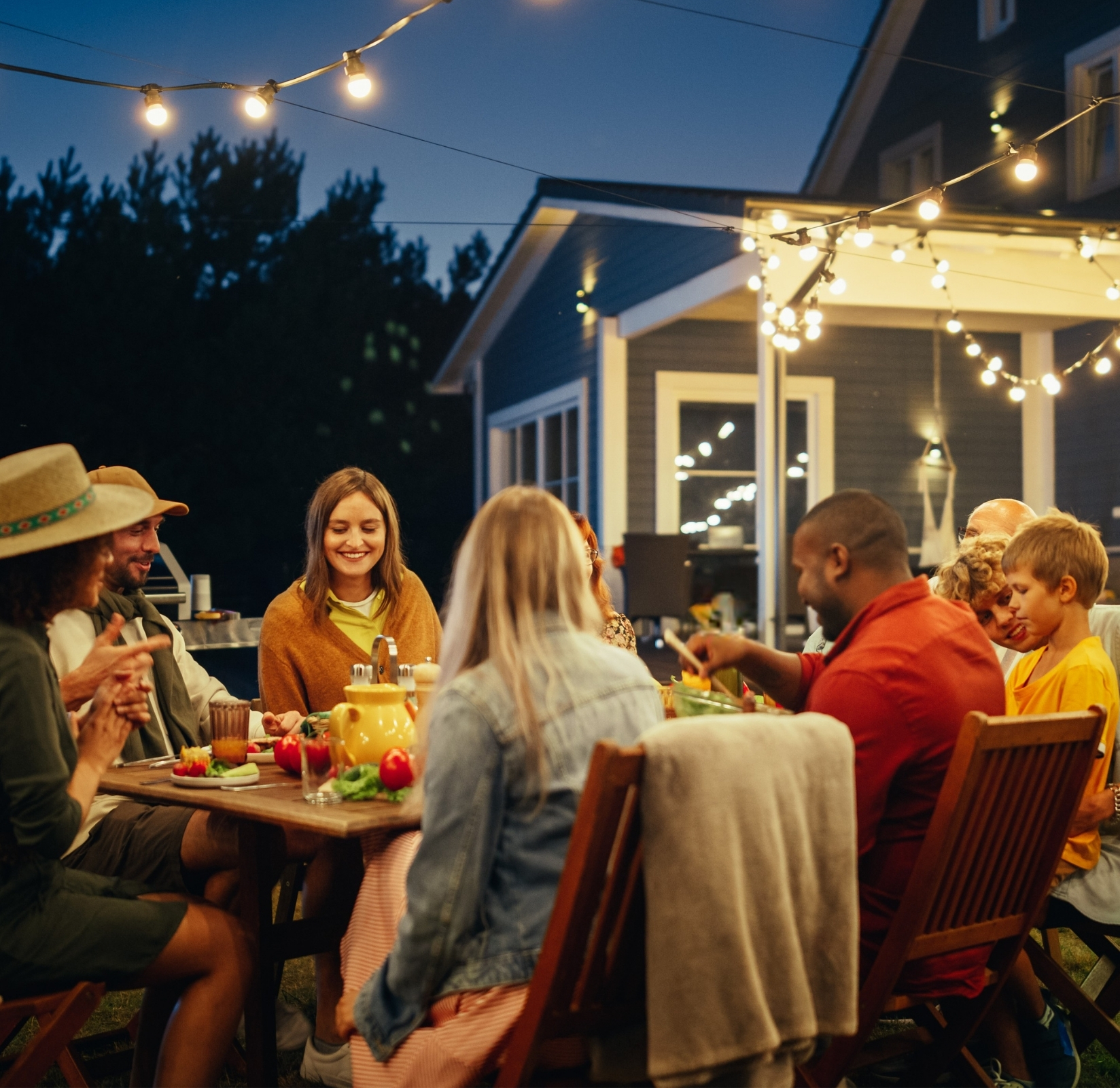 People eating outside on a summer evening