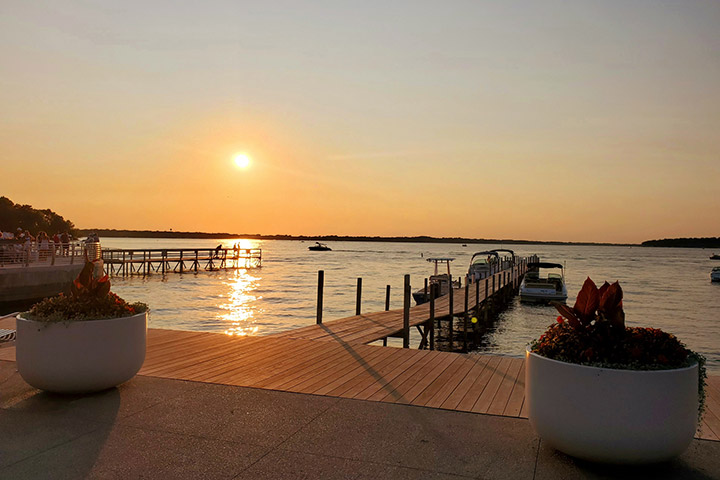 Iowa lake and dock during sunset