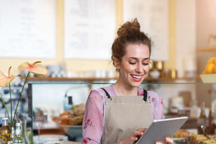 female restaurant owner working