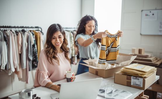 women business owners with clothes