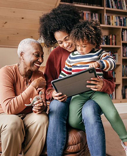 Three generations of a family in living room