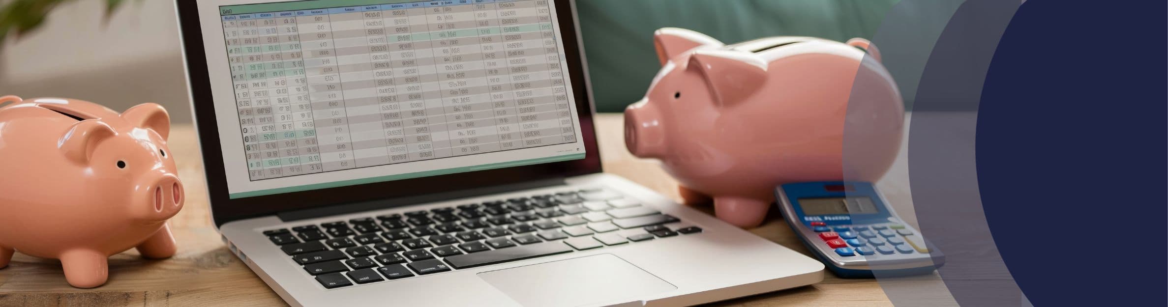 piggy banks next to laptop