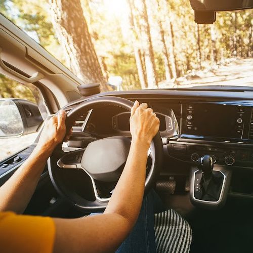 hands on a steering wheel