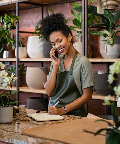 woman business owner of plant store