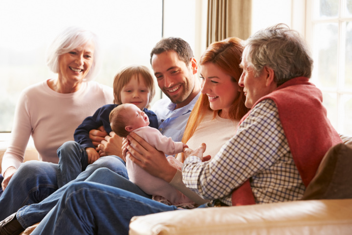 Multi-generations of a family on a couch